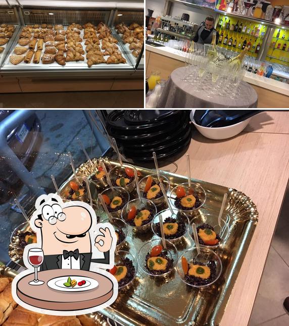 Eni cafe' si caratterizza per la cibo e bancone da bar