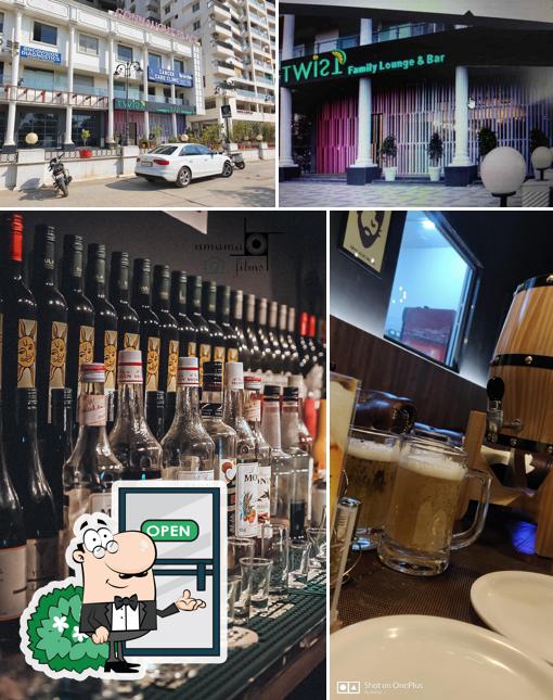 This is the image depicting exterior and drink at Twist Bar & Lounge