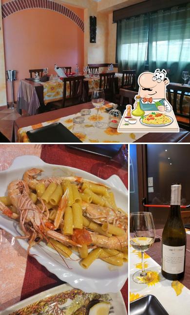 Tra le varie cose da L'osteria di Luisa si possono trovare la cibo e interni