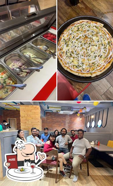 This is the picture showing food and interior at Real Spice Pizzeria Science City