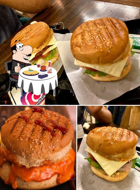 Order a burger at Tea & Talks Café