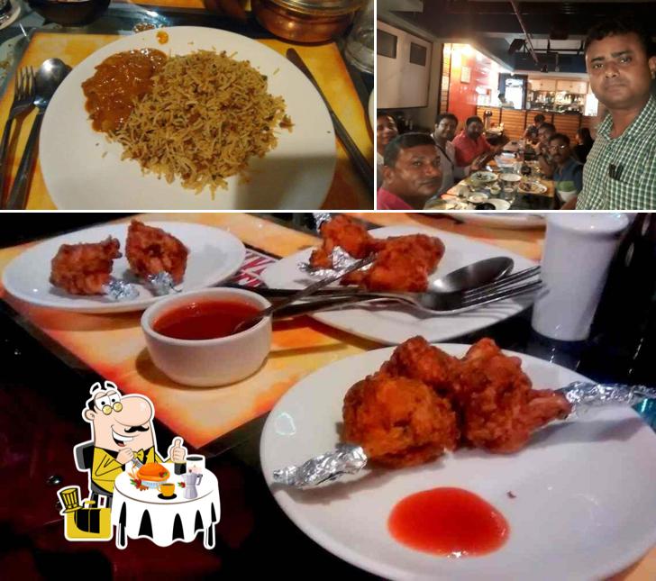 The picture of food and dining table at Silver Screen Bar cum Restaurant Tollygunge