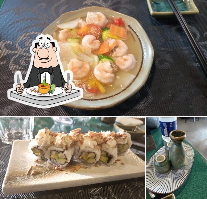 Questa è la immagine che raffigura la cibo e interni di Tokyo Sushi