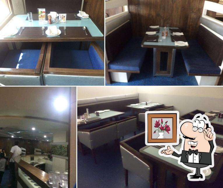 Take a seat at one of the tables at 1944 The Hocco Kitchen (Maninagar)