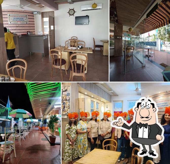 Take a seat at one of the tables at Cafe Sayantara