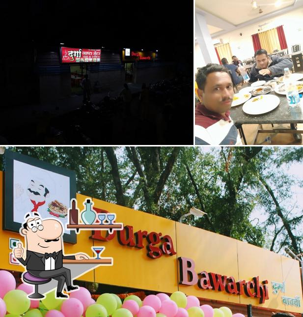 Take a seat at one of the tables at Hotel Durga Bawarchi