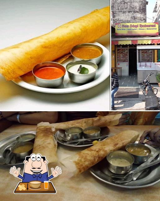 The image of New Udupi Restaurant’s food and exterior