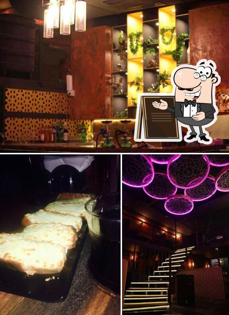 This is the image displaying exterior and food at Cafe Palm Atlantis