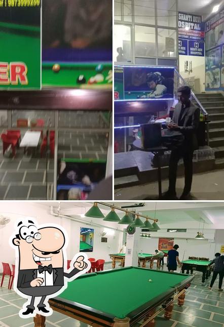 The interior of Jai Baba Snooker pool and Fast Food