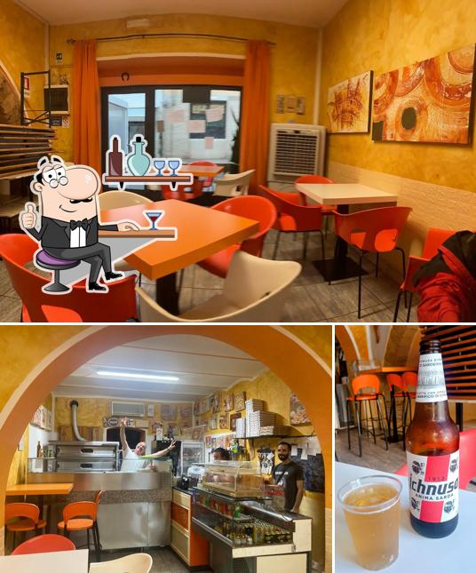 Siediti a un tavolo di Pizzeria Da Tata al Taglio e d'Asporto