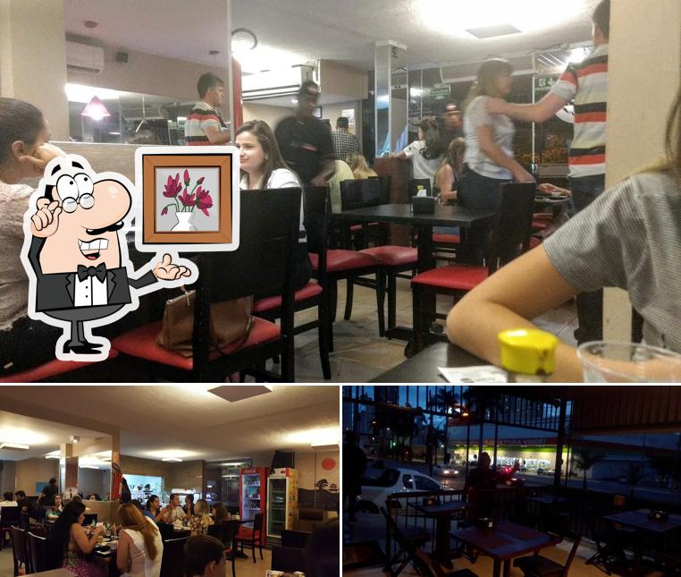 Sente em uma das mesas no Bankai Sushi