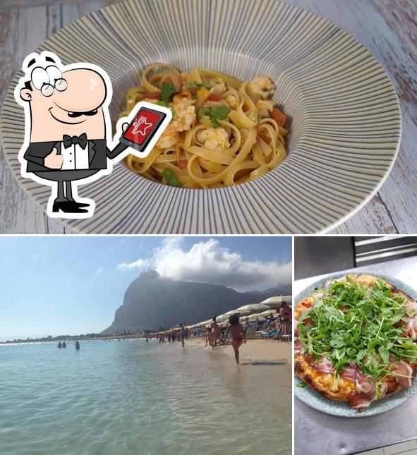 Tra le diverse cose da AL DELFINO Ristorante Pizzeria si possono trovare la esterno e cibo