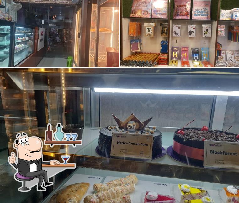 Take a seat at one of the tables at Winni Cakes & More