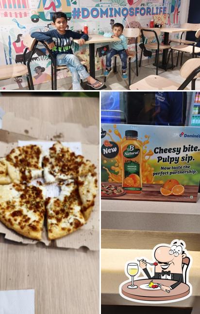 The picture of Domino's Pizza Harihar’s food and interior