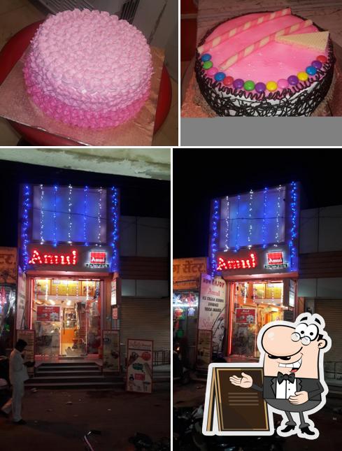 Check out the image displaying exterior and food at Sejals Amul Foodland