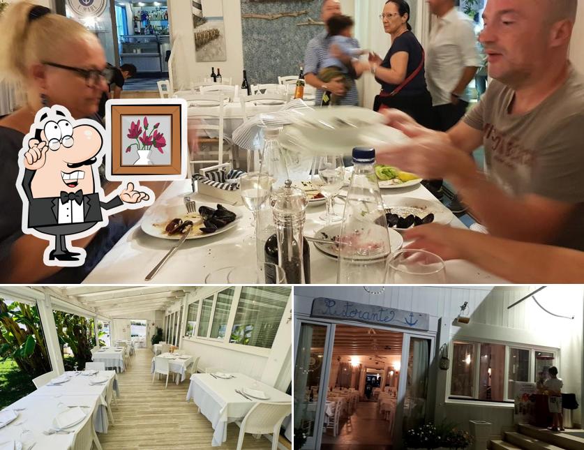 Dai un'occhiata agli interni di Taverna a Mare