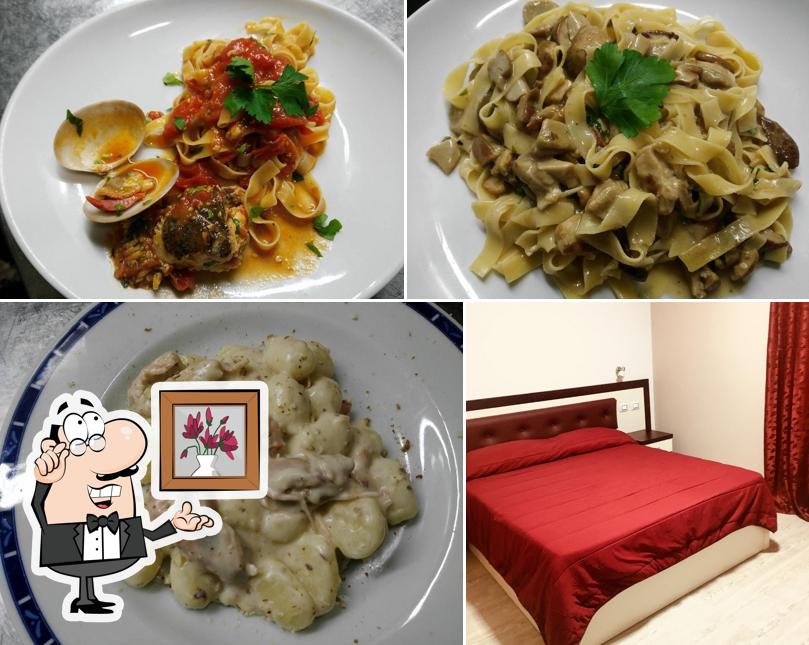 Siediti a un tavolo di Albergo Ristorante Pizzeria La Mimosa