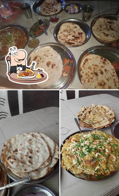 Get pizza at Deep Punjabi Dabha