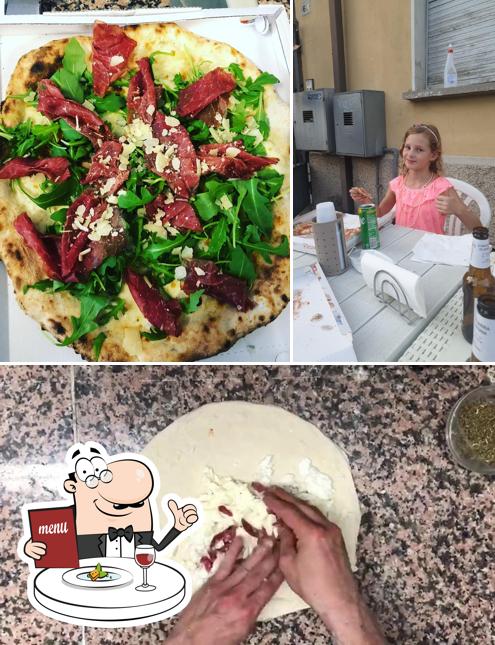 Questa è la immagine che raffigura la cibo e interni di Pizzerì