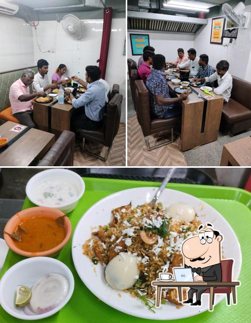 Check out the photo depicting interior and food at Craving’s hyderabadi biryani