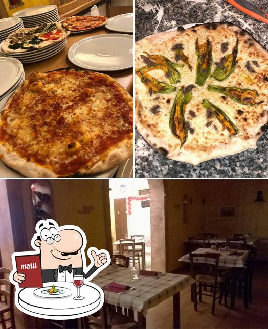 Questa è la foto che mostra la cibo e interni di Il Cavallino Rosso