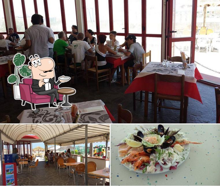 La foto di interni e cibo da Bagno Nettuno Ristorante