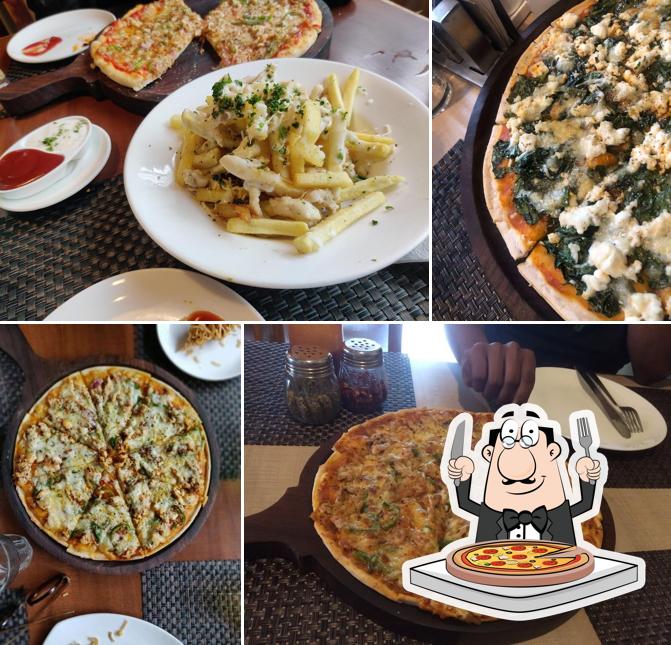 Order pizza at The Corner House Restaurant & Bar