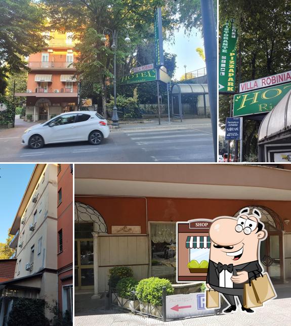 Puoi goderti l'aria fresca da seduto all'esterno di Hotel Ristorante Villa Robinia