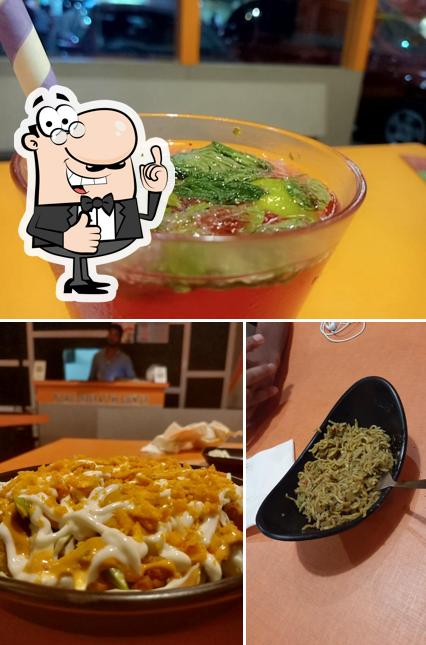 Look at this photo of Curly Cravings