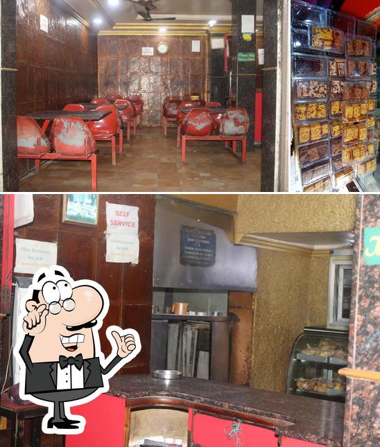 This is the photo displaying interior and food at Flora Cafe