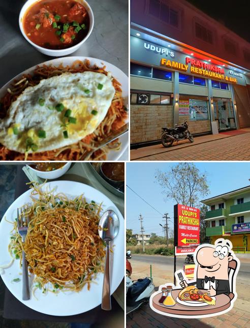 Get pizza at Prathiksha Family Restaurant & Bar