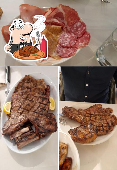 Prenditi i piatti di carne a Ristorante Fienil di Ferro
