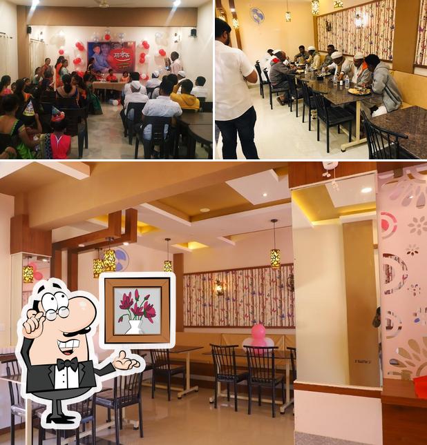 Check out how Hotel Sarthak Veg-Nonveg looks inside