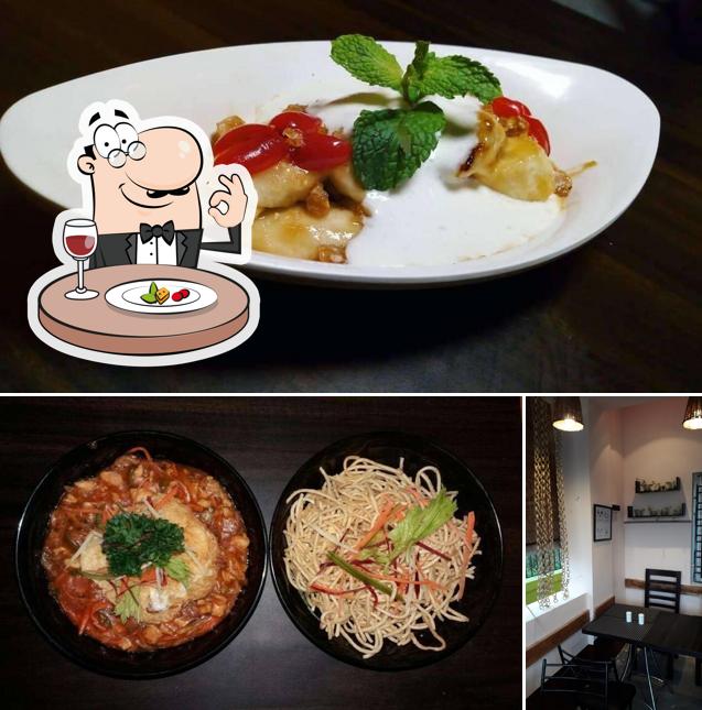 This is the photo displaying food and dining table at Emoji