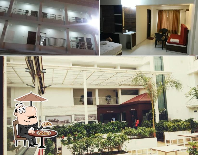 Take a look at the picture depicting exterior and interior at Hotel Madhuvan International