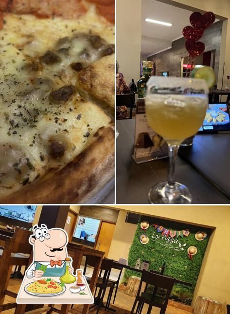 A imagem a La Pizza’s comida e interior