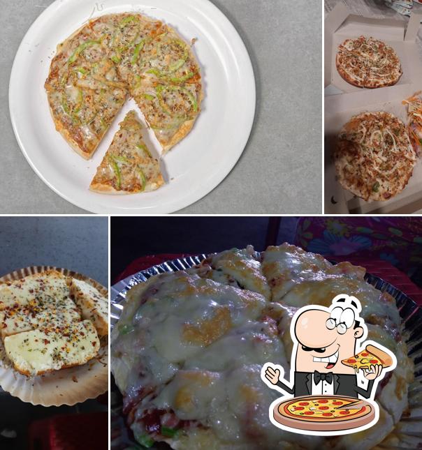 Try out pizza at Dev Fast Food