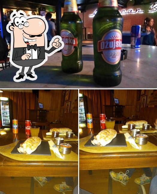 La immagine di interni e cibo da American Bar