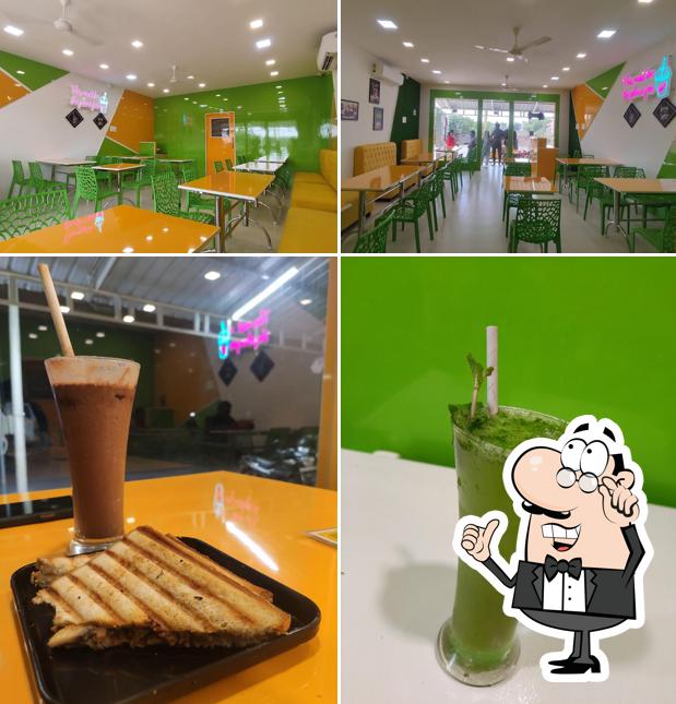 The photo of interior and drink at Juice World Fresh 'N' Juicy
