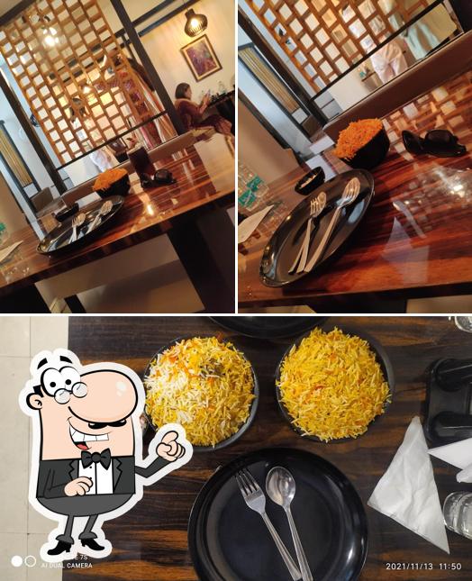 Among different things one can find interior and food at Kafyh Cafe