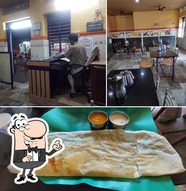 This is the image depicting interior and food at Vijaya Lakshmi Bhavan