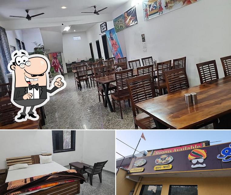 Take a look at the photo depicting interior and food at Shree Murti Nandan Kathiyawadi Restaurant Kumbhalgarh