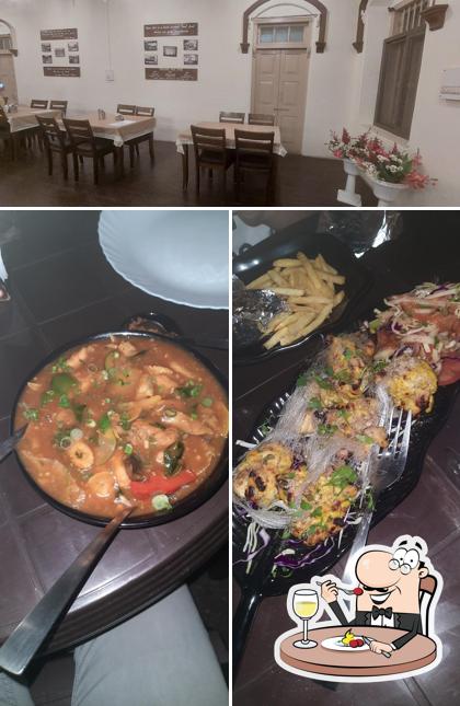 The picture of Grills and More’s food and interior