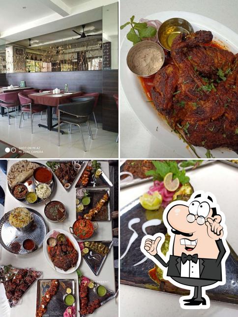Take a seat at one of the tables at Jai Malhar Bhojnalya
