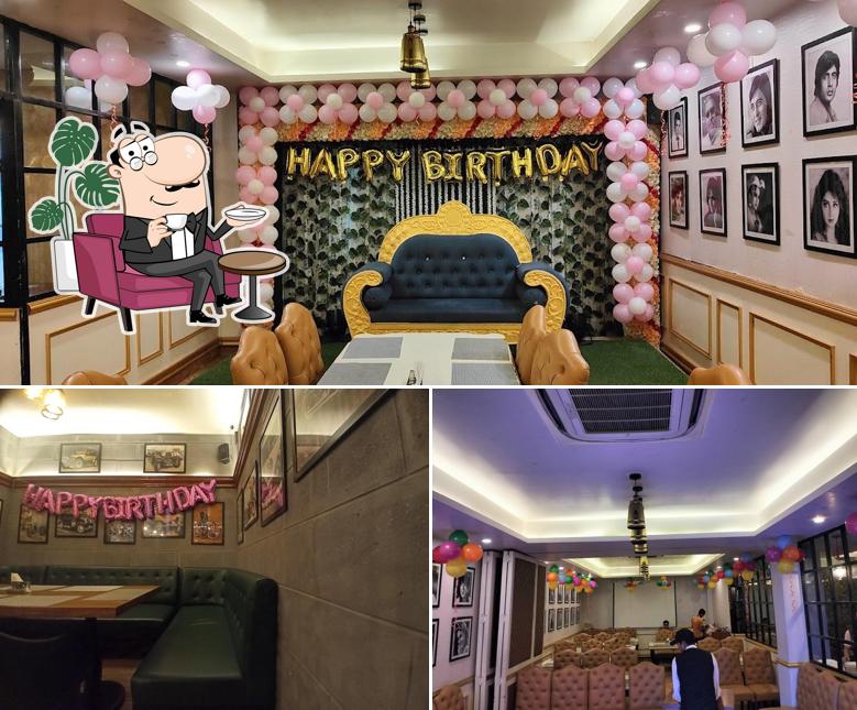 Take a seat at one of the tables at Dalchini Greens Restaurant