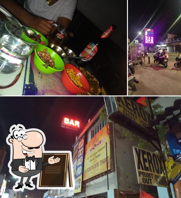The photo of Phoenix Bar & Restaurant’s exterior and dining table