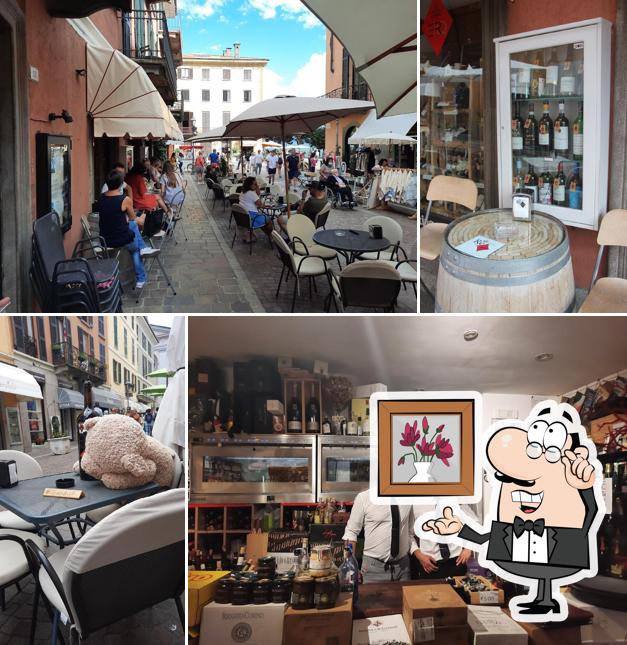 Siediti a un tavolo di Enoteca Re Di Quadri
