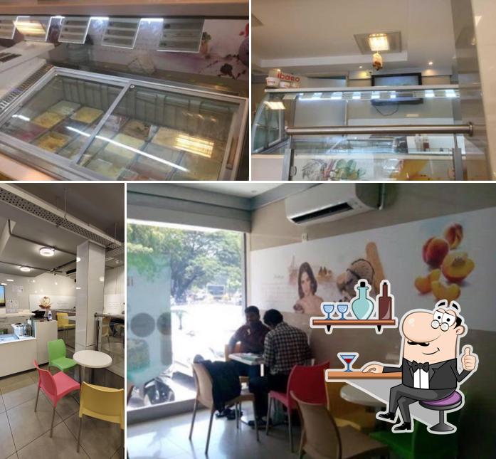 Take a seat at one of the tables at ibaco - Gopalapuram, Chennai