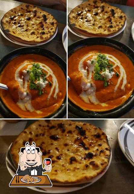 Get pizza at Rasoi Veg Inn