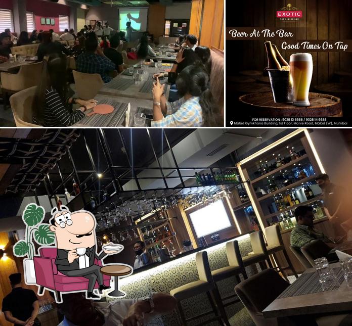 This is the image showing interior and beverage at Exotic - The Dining Bar